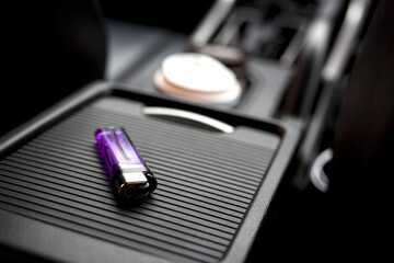 Cigarette lighter in the car - Powered by Adobe