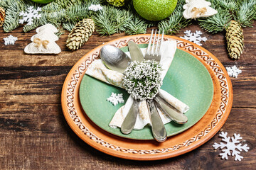 Obraz na płótnie Canvas Table setting for Christmas or New Year dinner