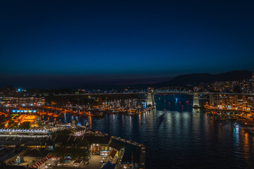 Burrard bridge and Granville Island over False Creek at dusk, Vancouver, BC, Canada