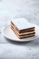 Morning breakfast with coffee and cake. Piece of cake on a plate