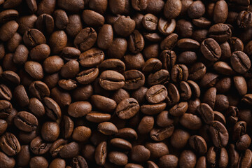 Closeup texture roasted coffee beans for background.