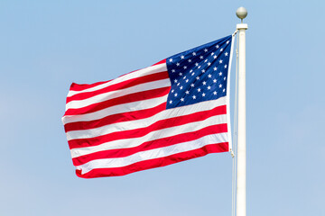 american flag waving in the wind