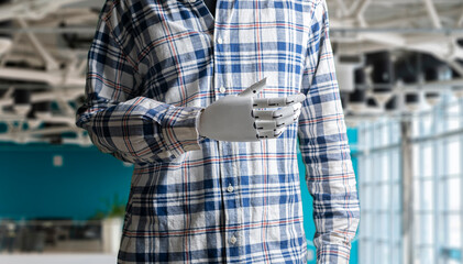 human like robot in casual clothes, futuristic technology, black and white metal hand