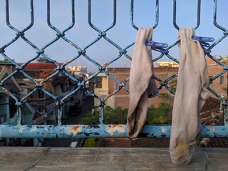 drying dirty wet socks in the morning