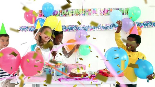 Animation of confetti falling over birthday cake and children having fun at party