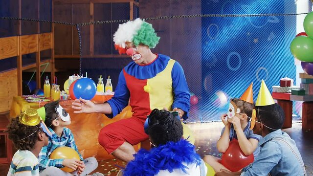 Animation of clown and children having fun at party