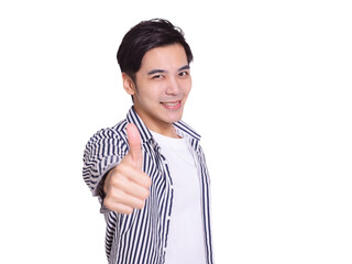 young man smiling and making thumbs up gesture