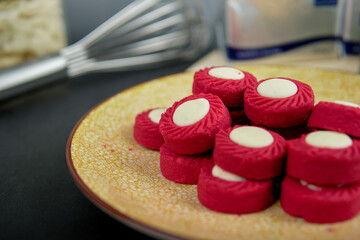 Malaysian Kuih Raya called Red Velvet Cheese Tart. Popular kuih raya on Hari Raya Aidilfitri in Malaysia. Selective focus.