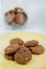 Homemade chocolate chips cookies fresh out of the oven. Selective focus.
