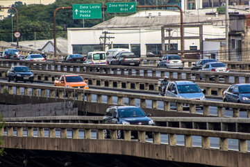 Morning with sun and heavy traffic on the East-West connection, Radial Leste Avenue, in downtown Sao Paulo,