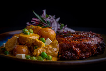 Meal and peruvian patato on a plate