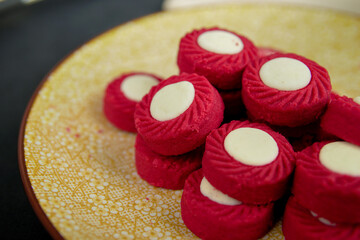 Malaysian Kuih Raya called Red Velvet Cheese Tart. Popular kuih raya on Hari Raya Aidilfitri in Malaysia. Selective focus.