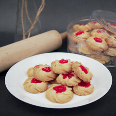 Malaysian Kuih Raya called Strawberry Butter Cookies. Popular kuih raya on Hari Raya Aidilfitri in Malaysia. Selective focus.