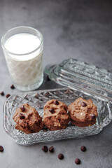 Chocolate crunchy cookies with background decoration. Selective focus.