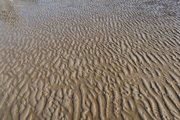 Wet sand wave texture and pattern