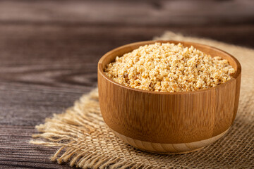 Bowl with Brazilian farofa. Made with manioc flour.