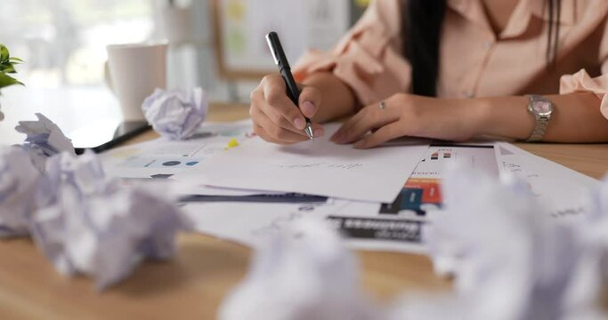 Woman with crumpled paper having problem
