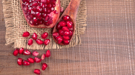 Fresh Pomegranate, rich in natural antioxidants. Concept of red fruits, vitamins and natural antioxidants to the skin for beauty.