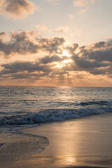 Sunset on the beach with clouds