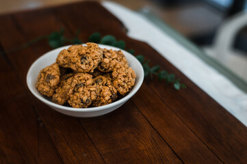 soft oatmeal cookies on a wooden table