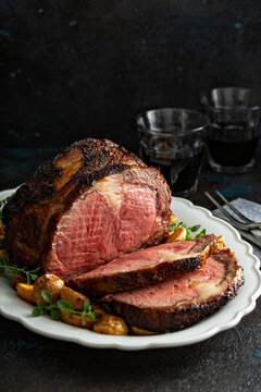 Prime Rib Roast Sliced For Celebration Dinner