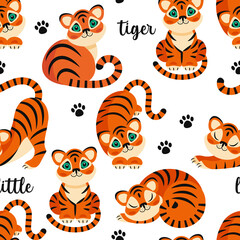 Fototapeta na wymiar small tigers make up a seamless pattern