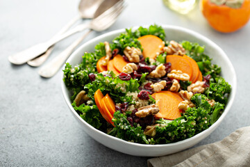 Fall salad with kale, walnuts and persimmon