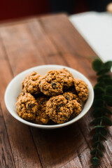 soft oatmeal cookies on a wooden table