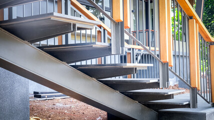 Steel stairs decorated with granite. Concept for design, interior and construction.