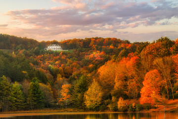 Autumn sunset at Cone Manor from Bass Lake near Blowing Rock and The Blue Ridge Parkway
