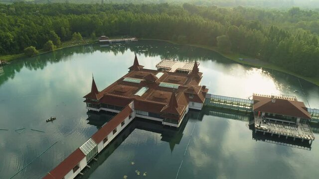 Aerial drone shot of wonderful Lake H&eacute;v&iacute;z on a beautiful day with town of Hev&iacute;z in the background
