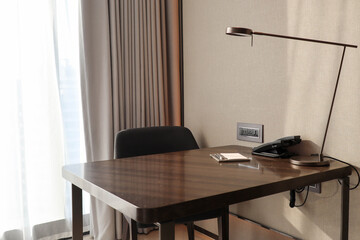 Fototapeta premium Wood working desk at the cozy room in apartment : work from home 
