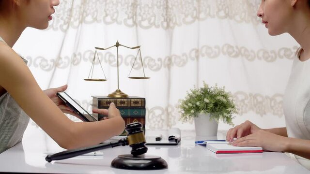 A lawyer and judge work out a legal solution that provides fairness and justice