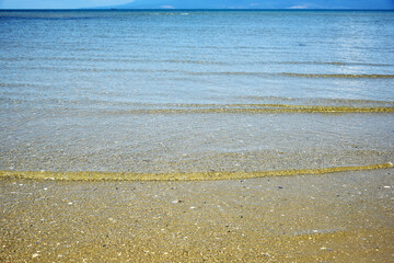 Calm sea off the coast on a sunny day