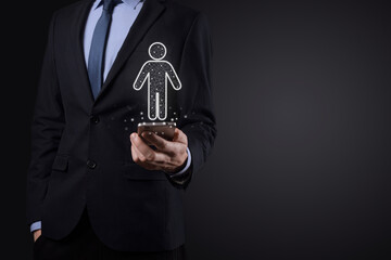 Businessman holds man person icon on dark tone background.HR Human ,people iconTechnology Process System Business with Recruitment, Hiring, Team Building. Organisation structure concept
