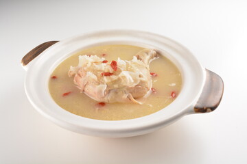 hot double boiled Chinese herbal ginseng chicken soup in claypot asian halal menu