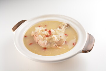 hot double boiled Chinese herbal ginseng chicken soup in claypot asian halal menu