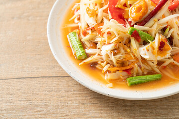 Som Tum - Thai Spicy green papaya salad with salty eggs