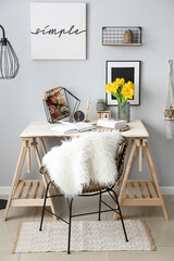 Interior of stylish room with modern workplace