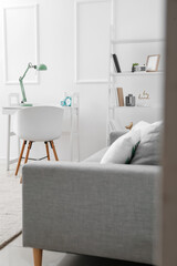 Interior of stylish room with modern workplace