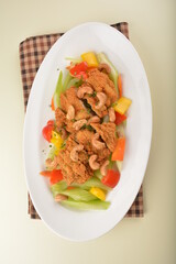 deep fried chicken cutlet chop with cashew nut and vegetables main course asian halal menu