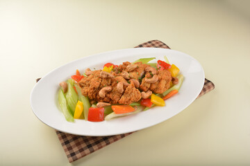 deep fried chicken cutlet chop with cashew nut and vegetables main course asian halal menu
