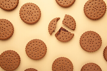 Chocolate chip cookie on beige background.Top view.