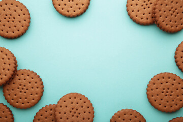 Chocolate chip cookie on blue background.Top view.