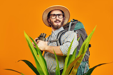 botanist with backpack - obrazy, fototapety, plakaty