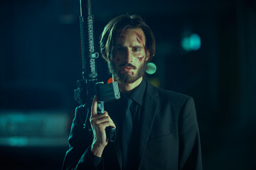 armed gangster with automatic guns