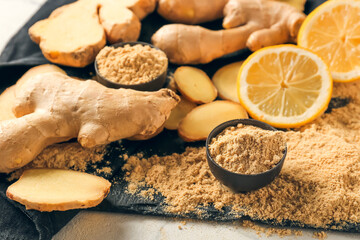 Composition with ginger powder on light background, closeup