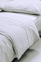 Fototapeta na wymiar Close up image of Bed mattress Duvet with pillow and blanket Top view