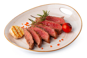 Medium rare grilled beef steak isolated on white