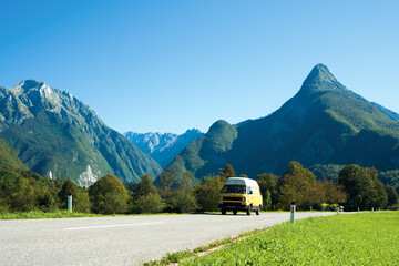 Vintage van on a mountain road © Yury Kirillov